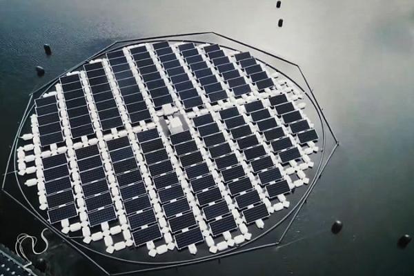 Video still of an island of solar panels from Business planet 2023 episode on unitary patent